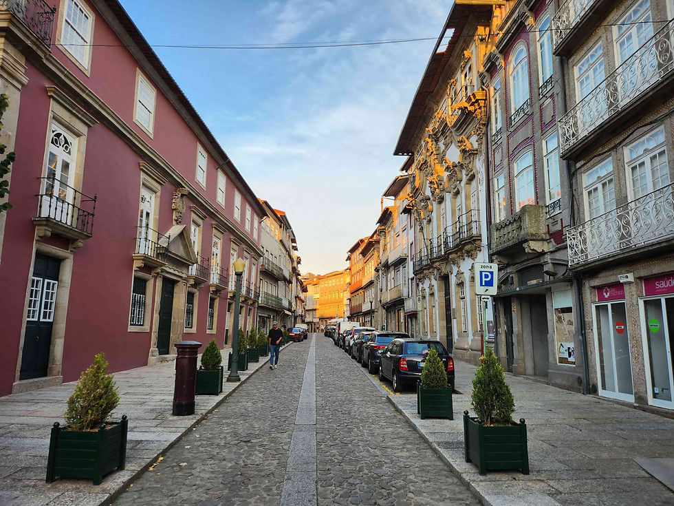 Historic architecture along a cobblestone street in Guimarães