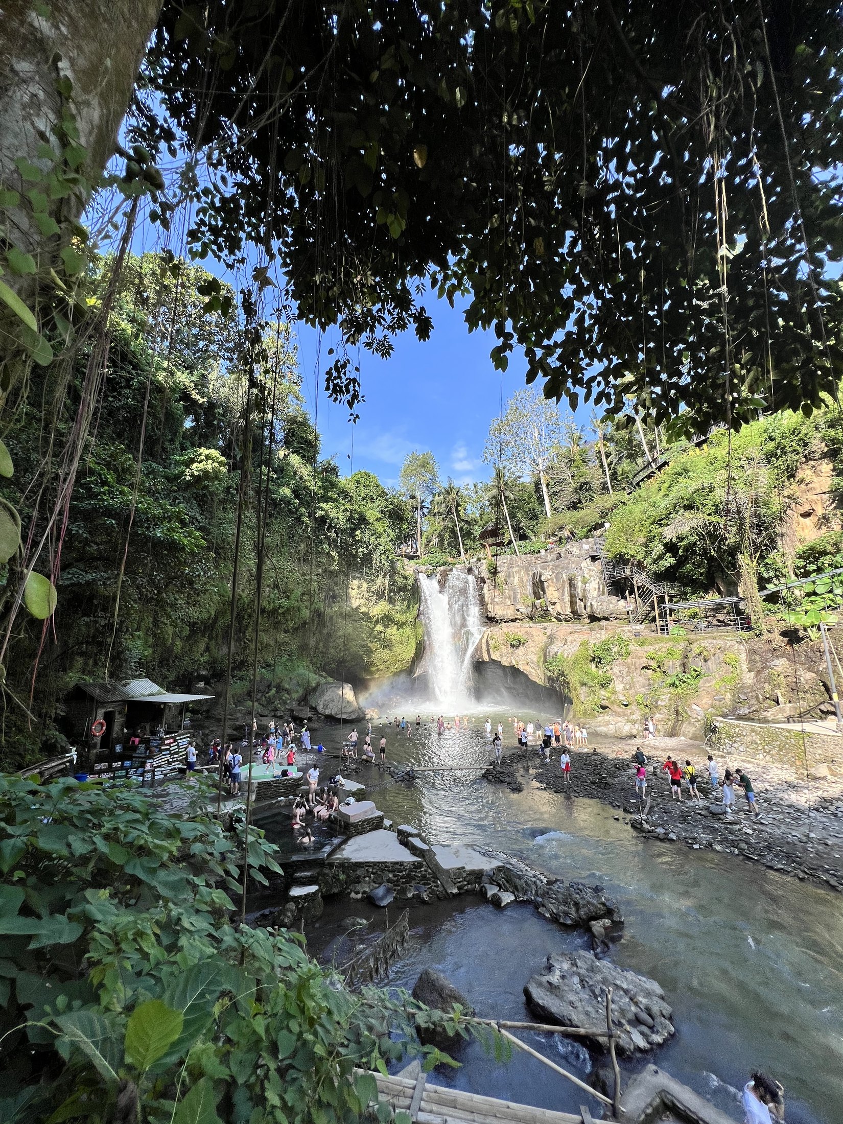 Original travel photograph: a rocky waterfall surrounded by woodland