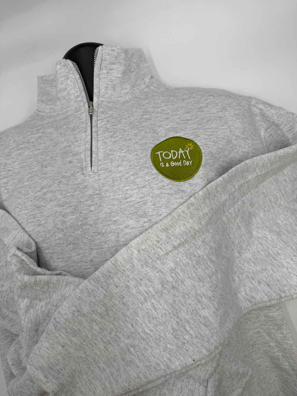 Light gray quarter zip sweatshirt with 'TODAY IS A GOOD DAY' logo