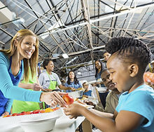 Volunteers Serving Food