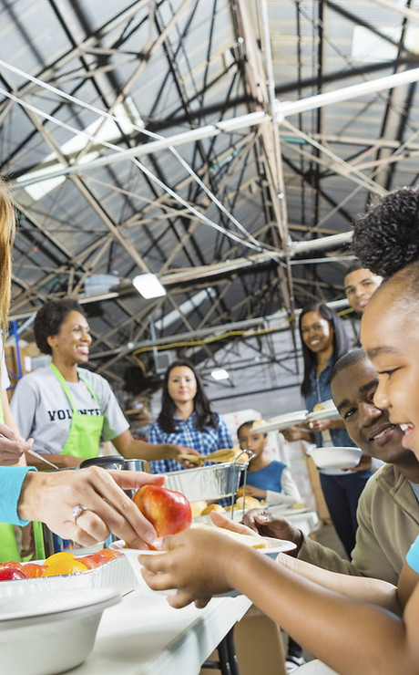 Volunteers Serving Food