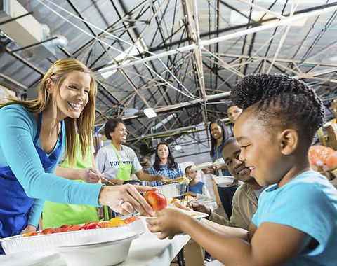 Volunteers Serving Food