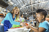 Volunteers Serving Food
