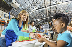 Volunteers Serving Food