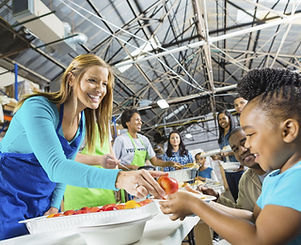 Volunteers Serving Food