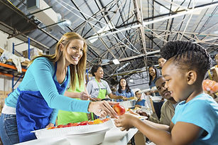 Volunteers Serving Food