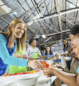 Volunteers Serving Food