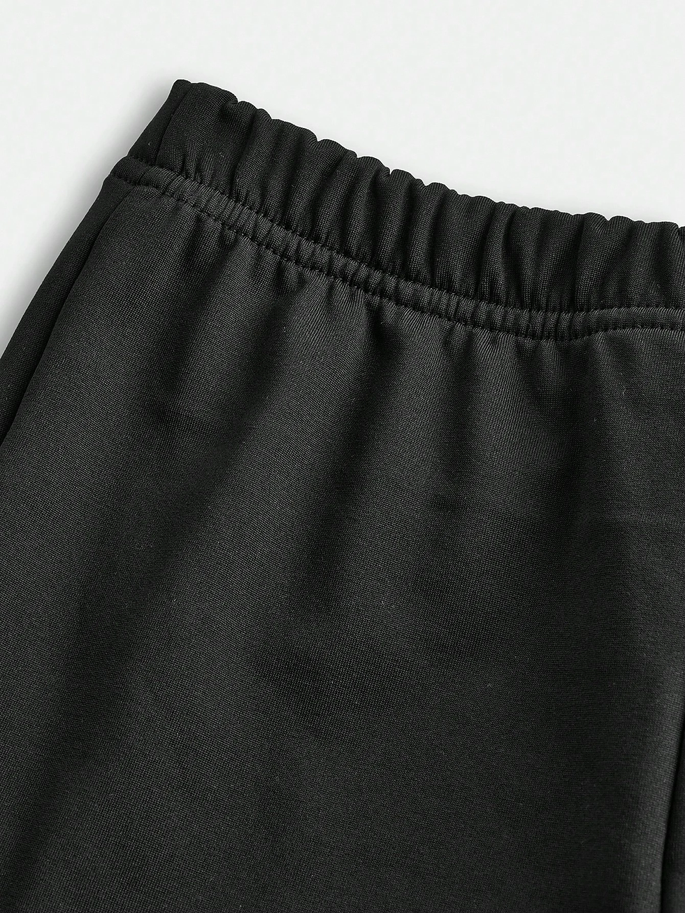 Thumbnail: Close-up of black FTH Unisex Hoodie waistband, Zantra07.