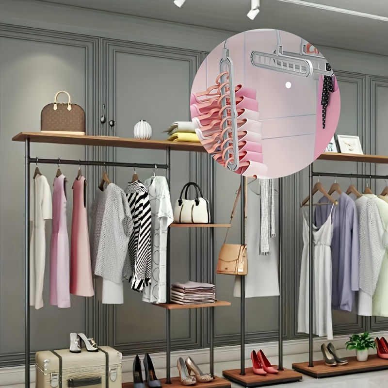 Thumbnail: Clothing rack with dresses and accessories