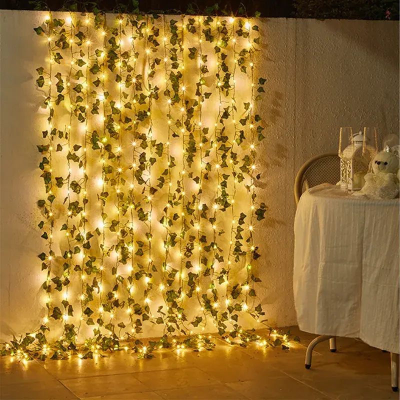 Thumbnail: Green ivy wall with lights.