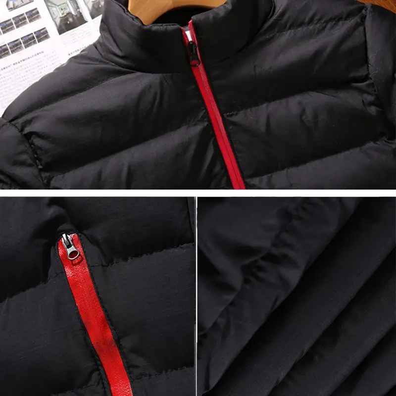Thumbnail: Black puffer jacket with red zipper detail.