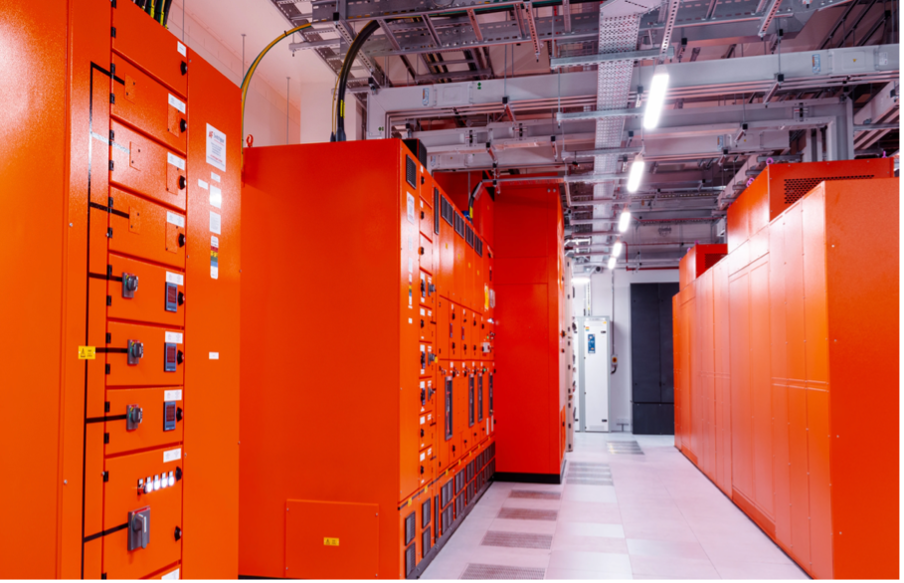 Modern data centre infrastructure showing power, cooling and cyber resilience for AI-driven operations.