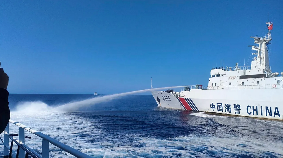 A Chinese coast guard ship uses its water cannons on a Philippine Bureau of Fisheries and Aquatic Resources vessel. Image Credit: Philippine Coast Guard via AP
