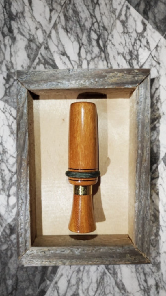 Framed medium duck calls