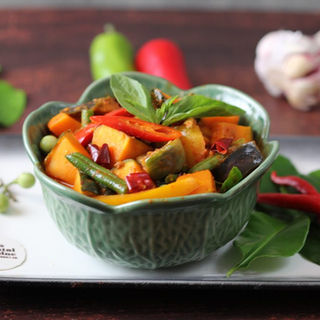 Thai pumpkin curry with coconut milk, vegetables and fragrant Thai herbs