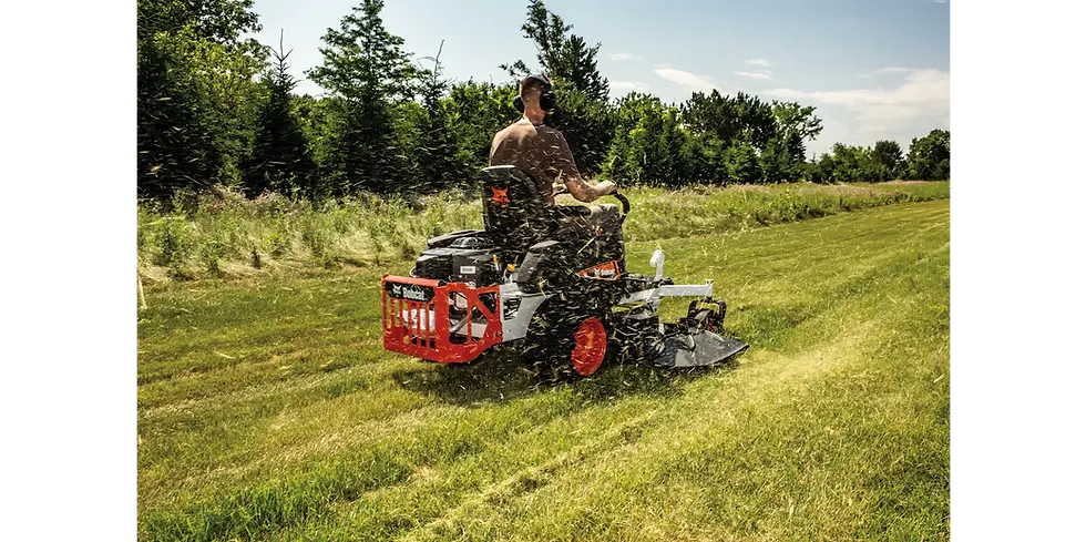 Thumbnail: A man operating a Bobcat mower cutting grass in a field.