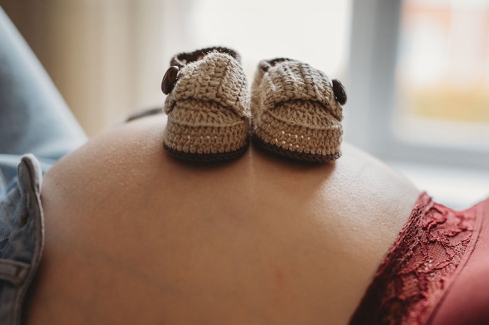 Baby shoes at a London maternity photoshoot
