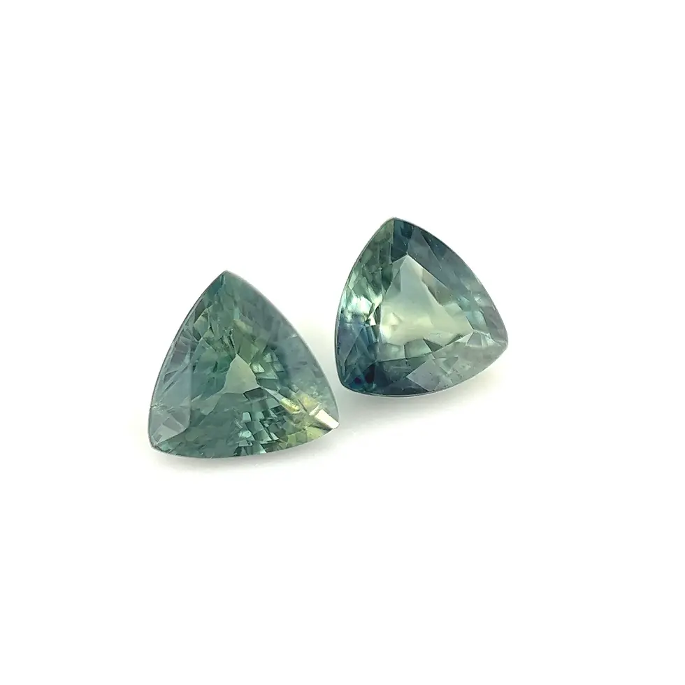 Thumbnail: Close-up of the Kenyan parti sapphires highlighting their natural color zoning and facets.