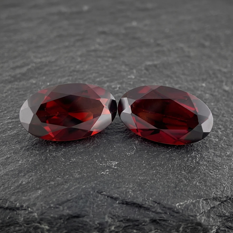 Thumbnail: Matched pair of natural Mozambique chrome pyrope garnets totaling 6.975 ct, with vivid blood-red color.