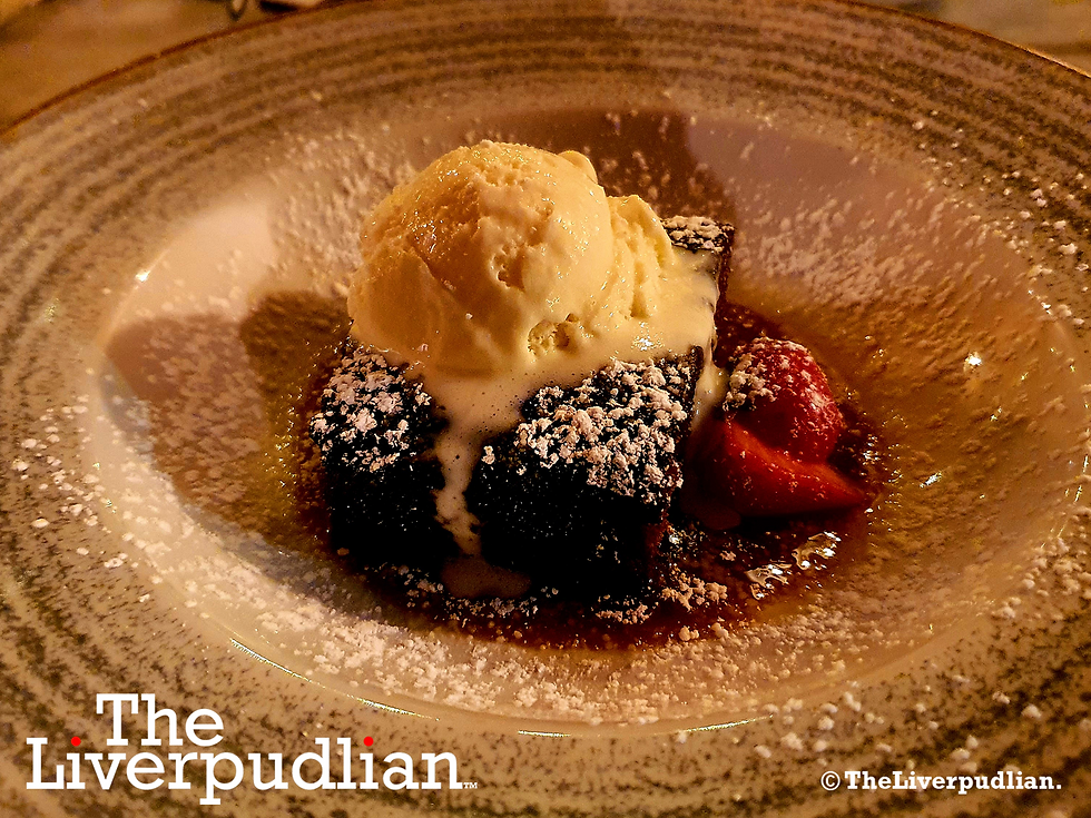 Ma Boyle's home-made Sticky Toffee Pudding with a Christmas Twist. Served with a caramel whisky sauce and vanilla ice cream (Credit: The Liverpudlian).