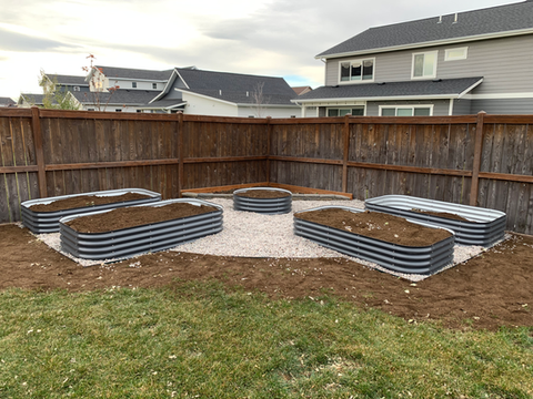Planting area with metal boxes and stone in Bozeman, MT
