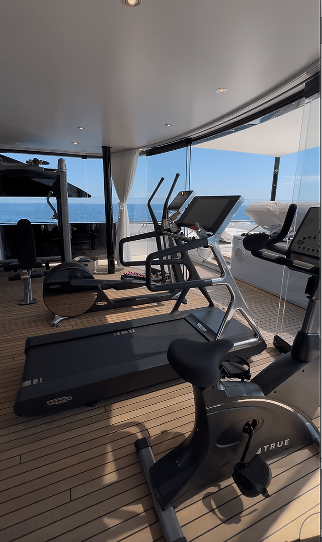 Deck filled with all gym equipment for work out onboard STARFIRE super yacht 