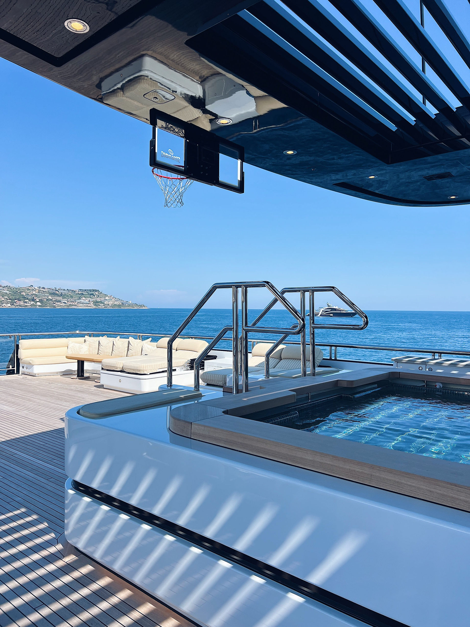 Jacuzzi and basketball area onboard superyacht STARFIRE