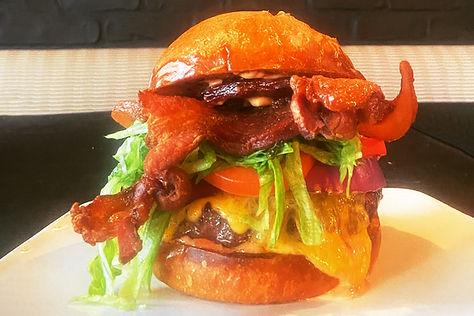 Main Street Cheeseburger. Cheddar, lettuce, tomato, onion, pickle, and our signature 320 sauce. Served on a brioche bun. Add apple wood bacon 4 | fried egg 3