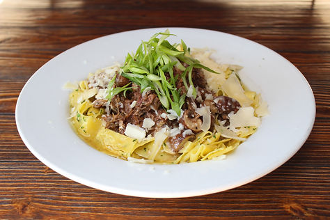 Short Rib Stroganoff. Slow braised short rib with mushrooms, reduced in au jus and cream. Served with pappardelle noodles and a dollop of sour cream.