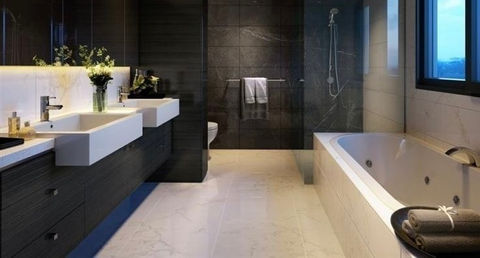 bathroom with a bath tub and mirror