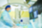 Interventional radiology. surgeon radiologist at operation during catheter based treatment