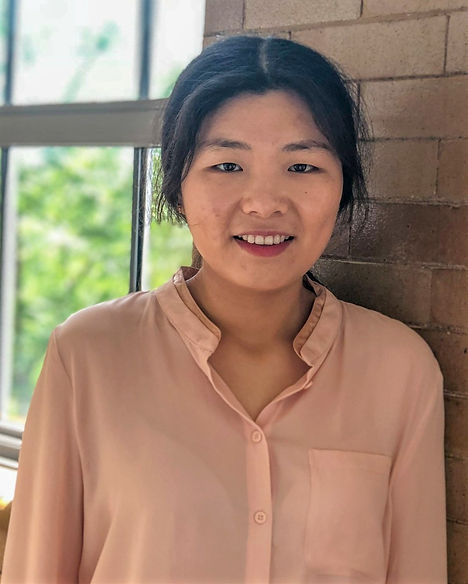 Wei Song in the Education Sciences Building after doctoral defense