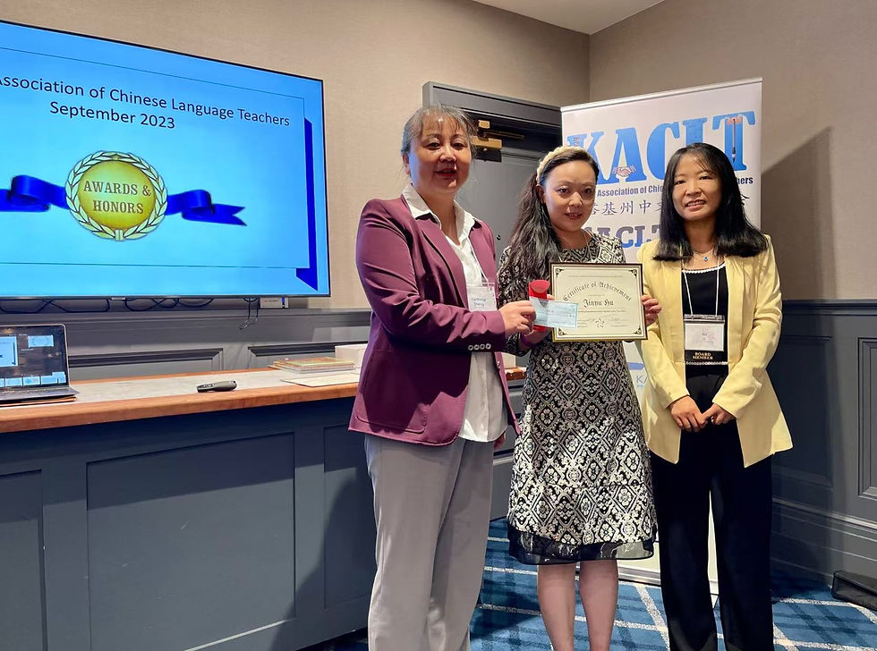 The picture shows Ms. Li Na, President of KACLT, and Ms. Zheng Yanhong, Director, presenting the honorary certificate to Teacher Hu