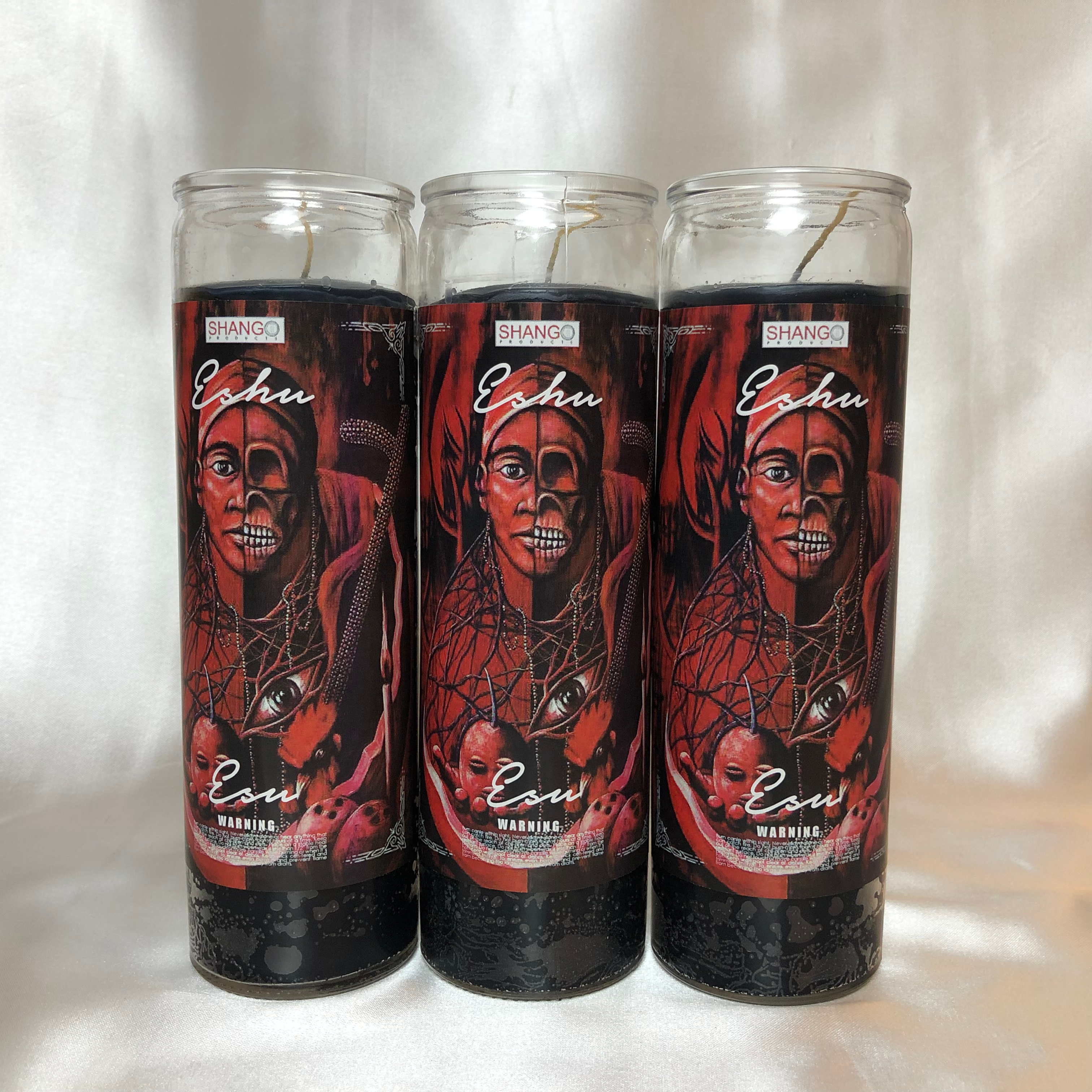 Eshu candle.