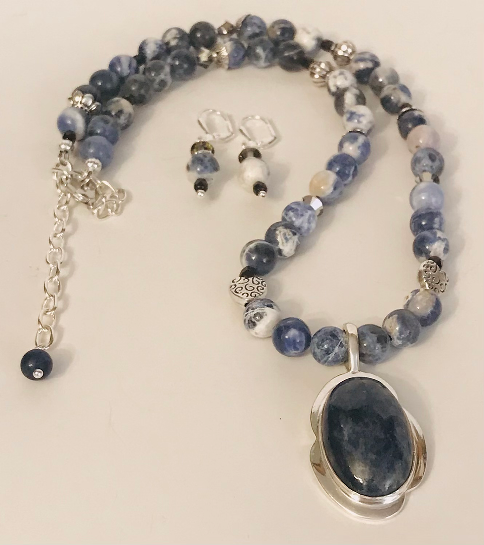 Sodalite stones with lapis gemstone in sterling silver setting 