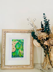 Earth Goddess art print displayed as decor. 