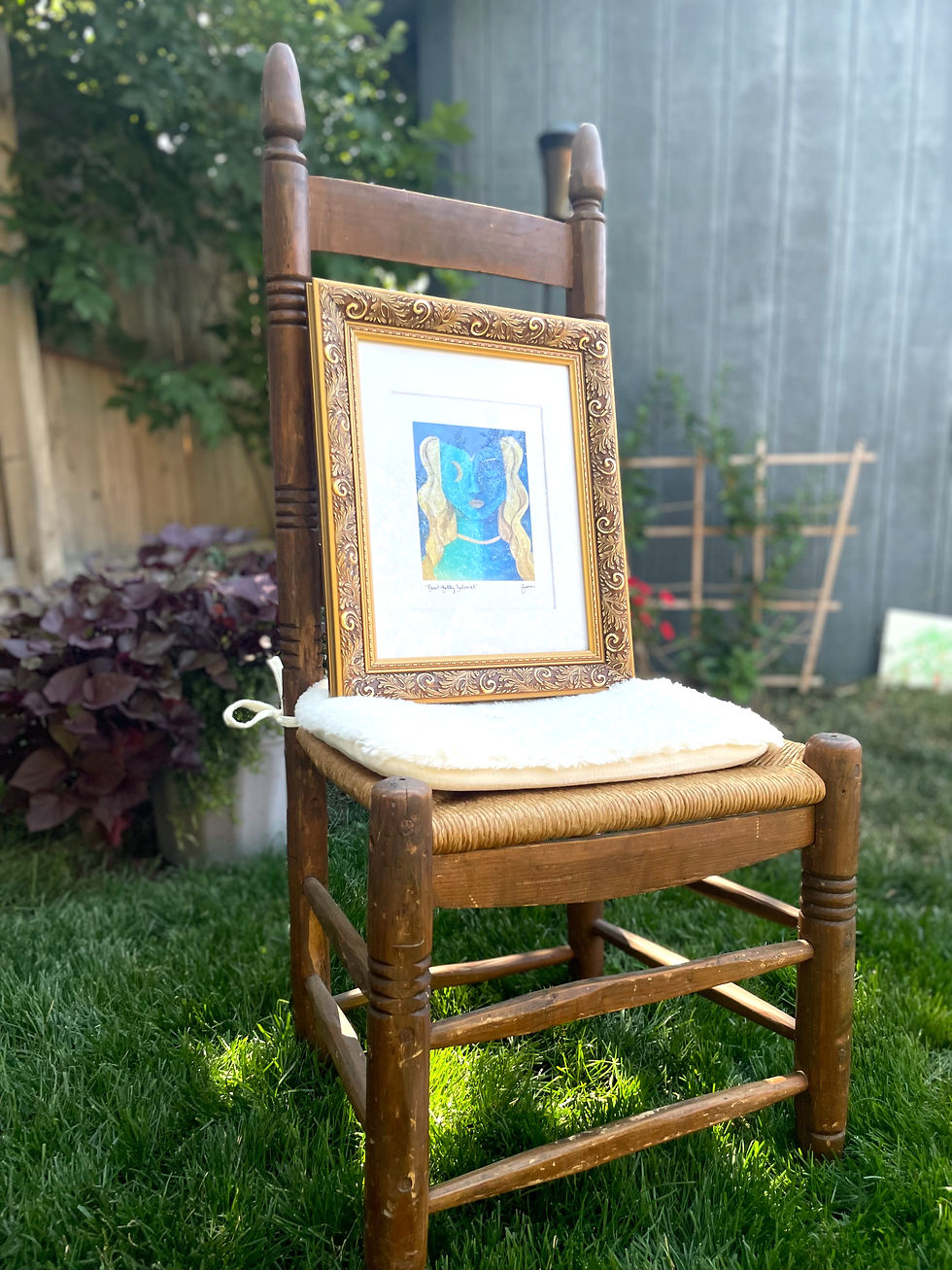 Thumbnail: Beautifully Balanced art print in a bronze frame. She is turquoise and blue goddess with golden hair. Her face has a crescent moon for an eye and she wears a gold necklace. The background is a night sky. She wears a golden necklace and represents harmony. 