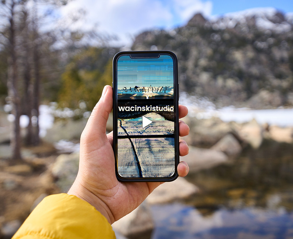 hiker-holding-smartphone-with-blank-screen-in-moun-2026-03-25-10-04-57-utc.jpg