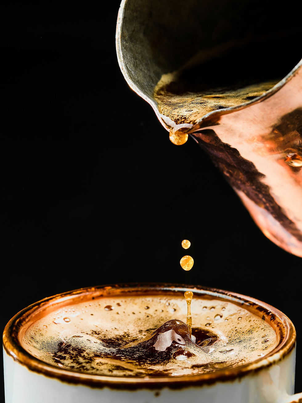 espresso-details-close-up-pouring-coffee-into-white-cup-from-coffee-pot-selective-focus-co