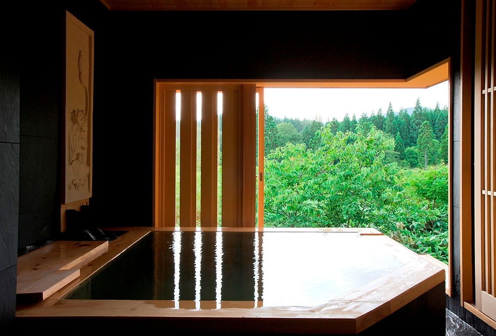 Overlook the green tapestry of Japan’s forests while relaxing in an onsen. Photo by Wabizakura Ryokan in Kakunodate, Akita