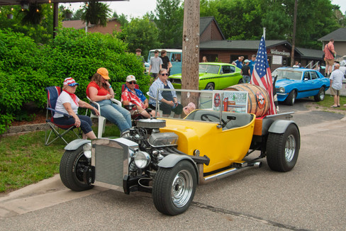 Classic cars and crowd scenes from the 7th Annual A&W Nisswa Cruisin' Night on July 5, 2025, in Nisswa, MN.