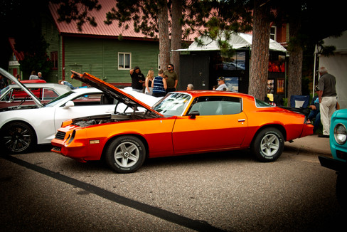 Classic cars and crowd scenes from the 7th Annual A&W Nisswa Cruisin' Night on July 5, 2025, in Nisswa, MN.