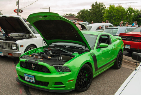Classic cars and crowd scenes from the 7th Annual A&W Nisswa Cruisin' Night on July 5, 2025, in Nisswa, MN.