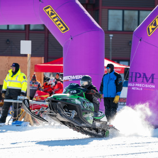 Snowmobile racing action at MESC TripleFest 2026 at Breezy Point Resort in the Brainerd Lakes Area.