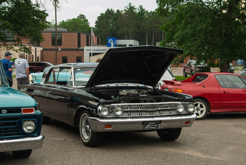 Classic cars and crowd scenes from the 7th Annual A&W Nisswa Cruisin' Night on July 5, 2025, in Nisswa, MN.