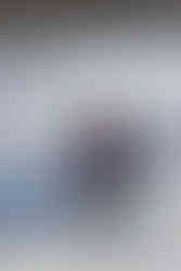 Families and kids enjoying the forest ice skating trail at Northland Arboretum on a winter afternoon