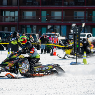Snowmobile racing action at MESC TripleFest 2026 at Breezy Point Resort in the Brainerd Lakes Area.