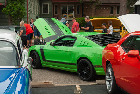 Classic cars and crowd scenes from the 7th Annual A&W Nisswa Cruisin' Night on July 5, 2025, in Nisswa, MN.