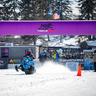 Snowmobile racing action at MESC TripleFest 2026 at Breezy Point Resort in the Brainerd Lakes Area.