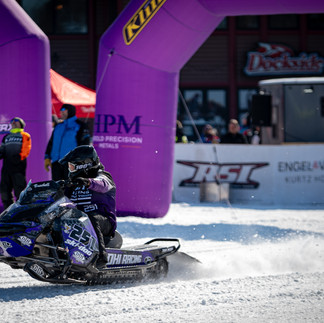 Snowmobile racing action at MESC TripleFest 2026 at Breezy Point Resort in the Brainerd Lakes Area.